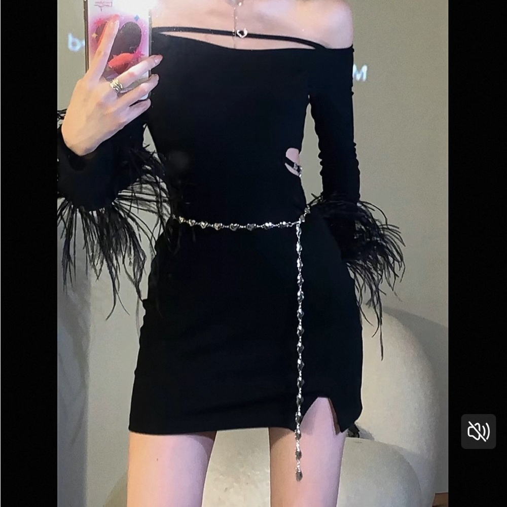 Elegant Black Off-Shoulder Dress with Feather Details